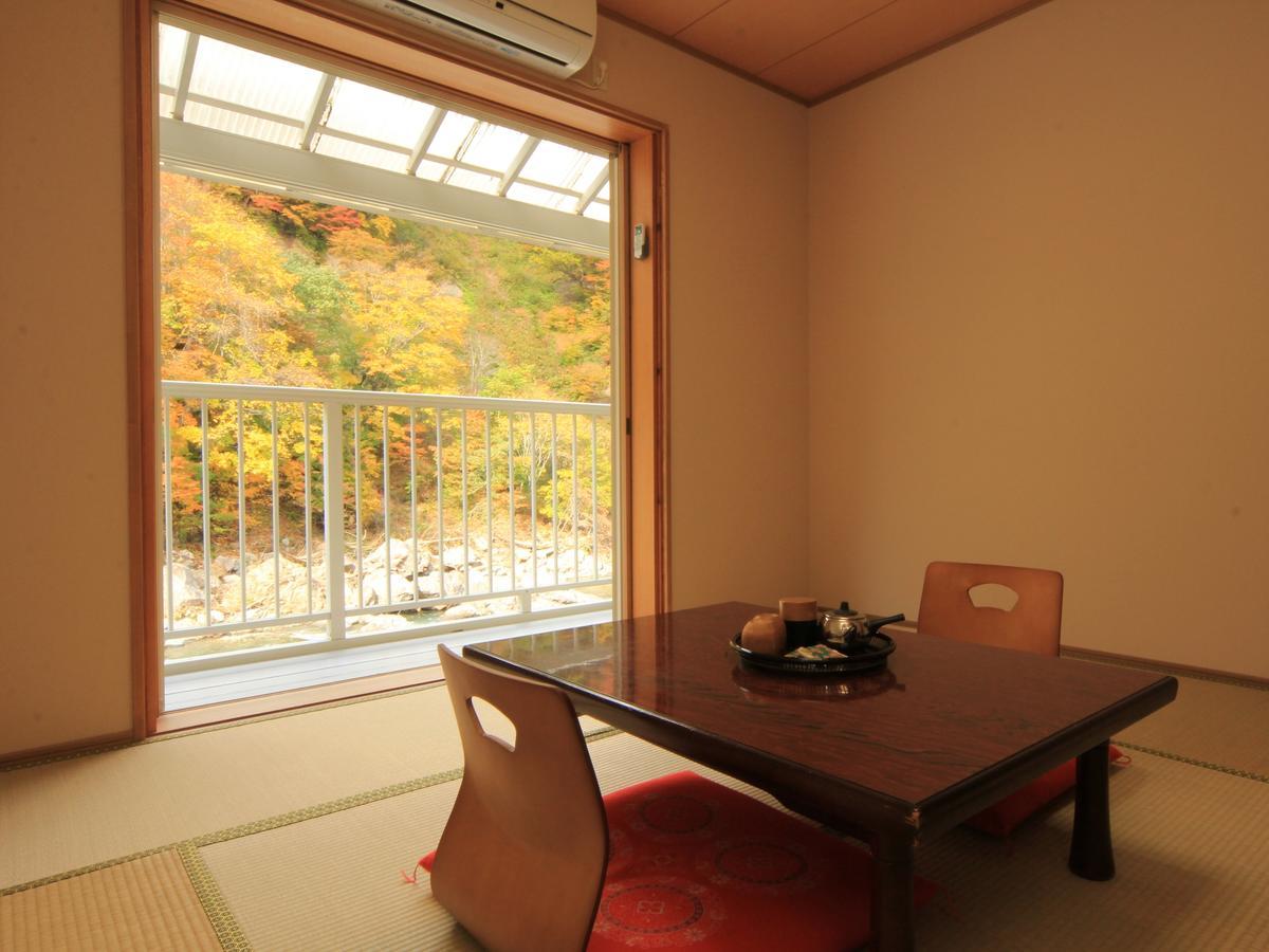Kiriake Riverside House Hotel Nagano Exterior photo