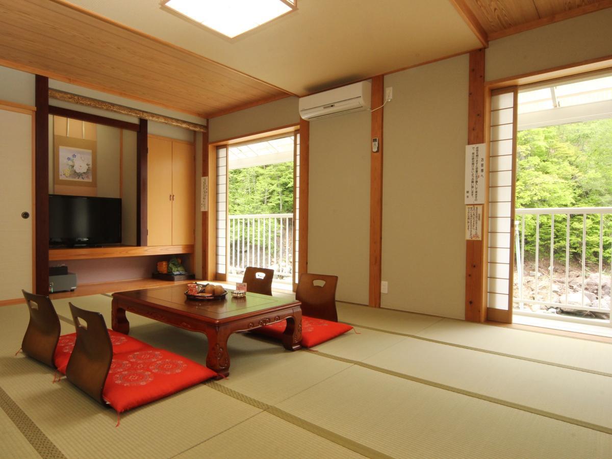 Kiriake Riverside House Hotel Nagano Exterior photo