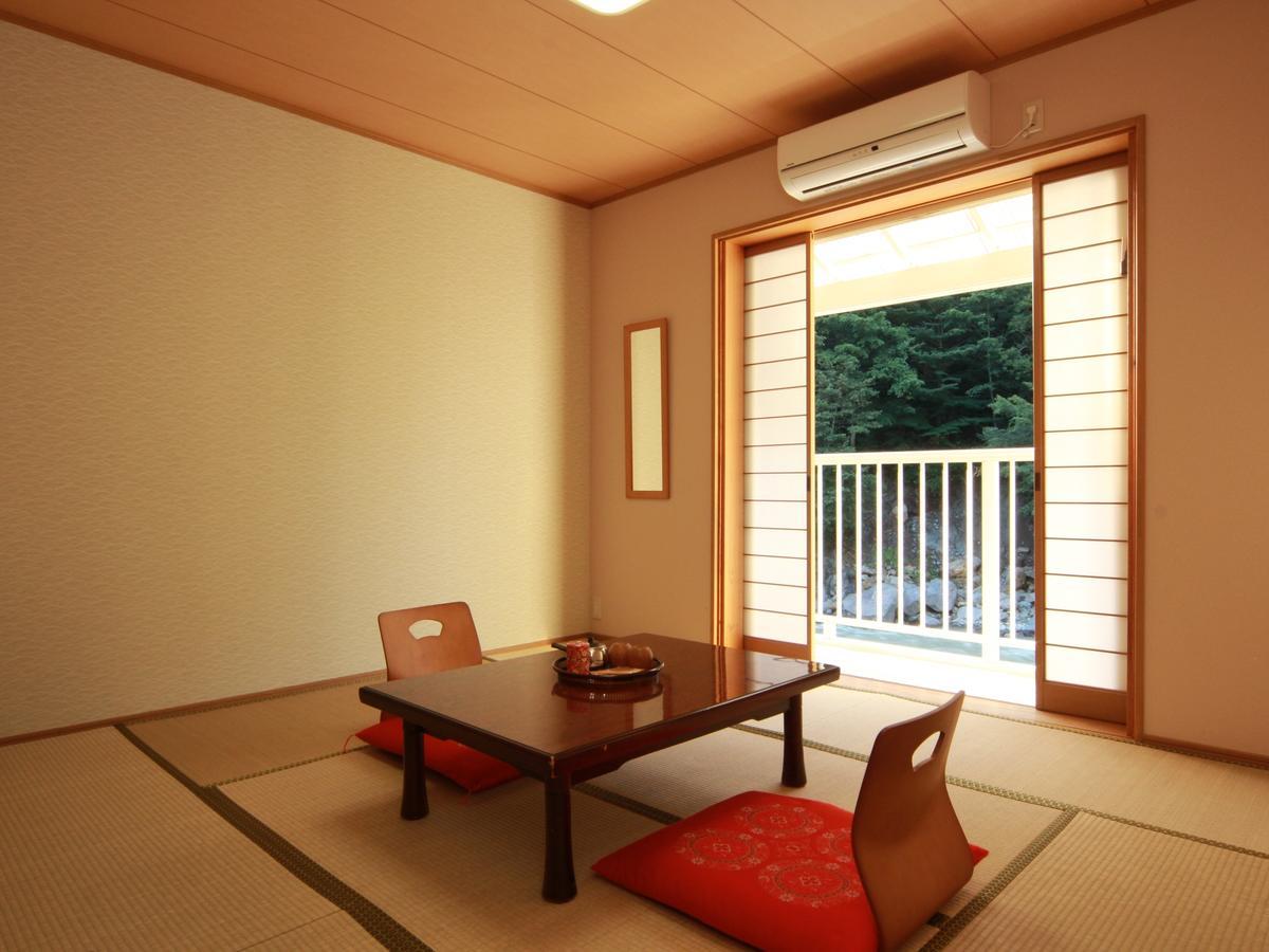 Kiriake Riverside House Hotel Nagano Exterior photo